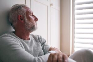 A man thinking about his heroin scars